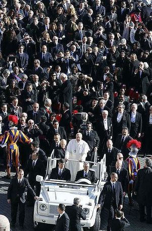 Francis giving a tour in the papal vehicle during the enthronement mass in St. Peter's Square on March 19, 2014