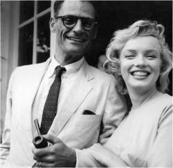 Marilyn Monroe with her third husband, playwright Arthur Miller .
