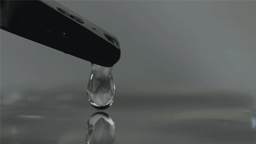 Spherical shape of a drop of water.